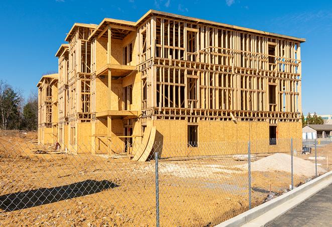 a temporary chain link fence locking away a building under renovation, serving as a security tool in Templeton, CA